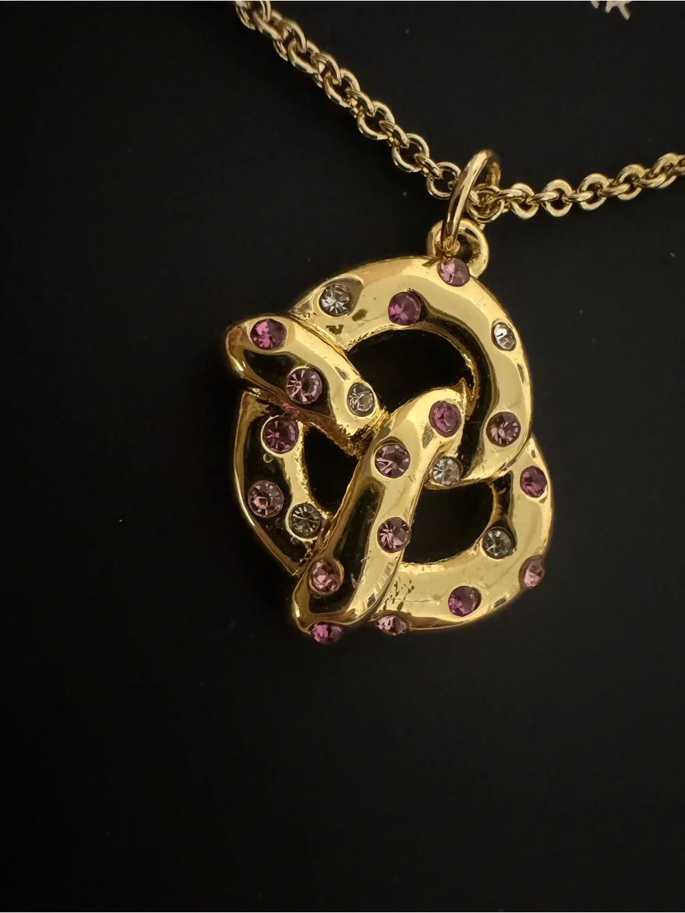 Coach Gold Pretzel Pendant Necklace with Pink Accents